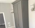 Grey painted double bowl vanity cabinet, shaker style doors, appliance door and drawer pulls