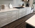 Maple cabinets with white lacquer finish.